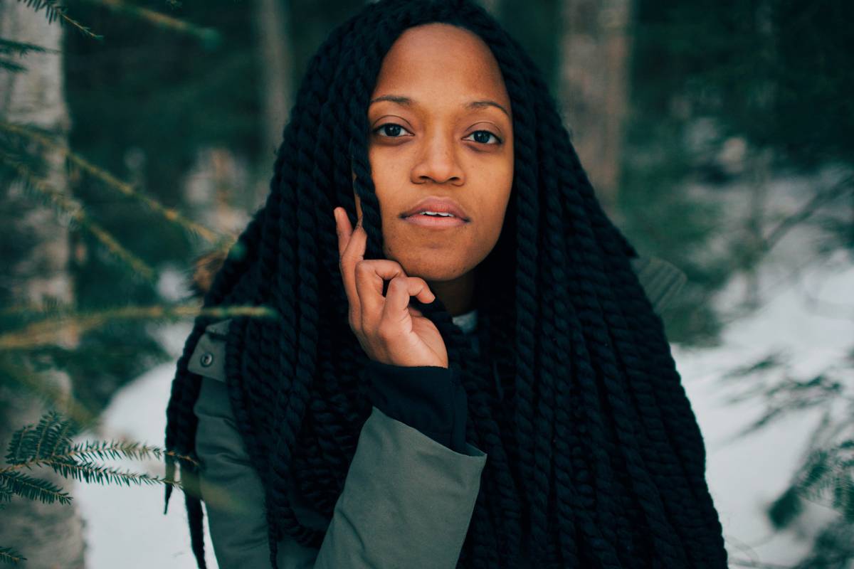 Afro-Friendly Twists applied on natural coily hair showing defined, frizz-free results